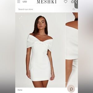 MESHKI GYWNETH OFF THE SHOULDER BOW MINI DRESS. White size small with tags